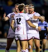 4 March 2023; Ulster players, Ben Moxham, Nathan Doak and Rob Herring congratulate teammate Stewart Moore after scoring a try during the United Rugby Championship match between Cardiff and Ulster at Cardiff Arms Park in Cardiff, Wales. Photo by John Dickson/Sportsfile