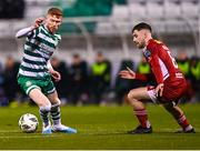 6 March 2023; Darragh Nugent of Shamrock Rovers in action against Aaron Bolger of Cork City during the SSE Airtricity Men's Premier Division match between Shamrock Rovers and Cork City at Tallaght Stadium in Dublin. Photo by Piaras Ó Mídheach/Sportsfile