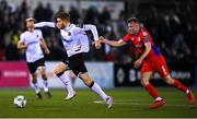 6 March 2023; Connor Malley of Dundalk in action against Jonathan Lunney of Shelbourne during the SSE Airtricity Men's Premier Division match between Dundalk and Shelbourne at Oriel Park in Dundalk, Louth. Photo by Ramsey Cardy/Sportsfile