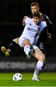 6 March 2023; Freddie Draper of Drogheda United is tackled by Kacper Radkowski of Bohemians during the SSE Airtricity Men's Premier Division match between Bohemians and Drogheda United at Dalymount Park in Dublin. Photo by Harry Murphy/Sportsfile