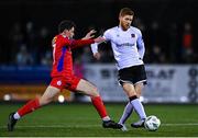 6 March 2023; Connor Malley of Dundalk in action against Kian Leavy of Shelbourne during the SSE Airtricity Men's Premier Division match between Dundalk and Shelbourne at Oriel Park in Dundalk, Louth. Photo by Ramsey Cardy/Sportsfile