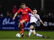6 March 2023; Darragh Leahy of Dundalk is tackled by Jonathan Lunney of Shelbourne during the SSE Airtricity Men's Premier Division match between Dundalk and Shelbourne at Oriel Park in Dundalk, Louth. Photo by Ramsey Cardy/Sportsfile