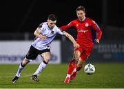 6 March 2023; Darragh Leahy of Dundalk in action against John Ross Wilson of Shelbourne during the SSE Airtricity Men's Premier Division match between Dundalk and Shelbourne at Oriel Park in Dundalk, Louth. Photo by Ramsey Cardy/Sportsfile