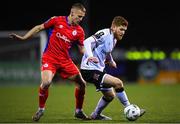 6 March 2023; Connor Malley of Dundalk is tackled by Brian McManus of Shelbourne during the SSE Airtricity Men's Premier Division match between Dundalk and Shelbourne at Oriel Park in Dundalk, Louth. Photo by Ramsey Cardy/Sportsfile