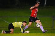 6 March 2023; Ollie O'Neill of Derry City goes past UCD goalkeeper Lorcan Healy on his way to scoring his side's third goal during the SSE Airtricity Men's Premier Division match between UCD and Derry City at the UCD Bowl in Dublin. Photo by Stephen McCarthy/Sportsfile