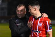 6 March 2023; Derry City assistant manager Alan Reynolds with Jordan McEneff of Derry City after the SSE Airtricity Men's Premier Division match between UCD and Derry City at the UCD Bowl in Dublin. Photo by Stephen McCarthy/Sportsfile
