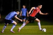 6 March 2023; Jordan McEneff of Derry City in action against Brendan Barr of UCDduring the SSE Airtricity Men's Premier Division match between UCD and Derry City at the UCD Bowl in Dublin. Photo by Stephen McCarthy/Sportsfile