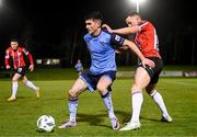 6 March 2023; Brendan Barr of UCD in action against Ben Doherty of Derry City during the SSE Airtricity Men's Premier Division match between UCD and Derry City at the UCD Bowl in Dublin. Photo by Stephen McCarthy/Sportsfile