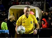 6 March 2023; Referee Ray Matthews picks up the matchball before during the SSE Airtricity Men's Premier Division match between Bohemians and Drogheda United at Dalymount Park in Dublin. Photo by Harry Murphy/Sportsfile