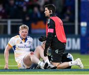 4 March 2023; Jamie Osborne of Leinster receives treatment from Leinster team doctor Stuart O'Flanagan during the United Rugby Championship match between Edinburgh and Leinster at The Dam Health Stadium in Edinburgh, Scotland. Photo by Harry Murphy/Sportsfile