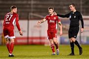 6 March 2023; Referee Robert Harvey alongside Cian Bargary and Kevin Custovic, 27, of Cork City during the SSE Airtricity Men's Premier Division match between Shamrock Rovers and Cork City at Tallaght Stadium in Dublin. Photo by Piaras Ó Mídheach/Sportsfile