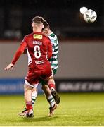 6 March 2023; Aaron Bolger of Cork City and Trevor Clarke of Shamrock Rovers collide late on, before Bolger was substituted due to injury, during the SSE Airtricity Men's Premier Division match between Shamrock Rovers and Cork City at Tallaght Stadium in Dublin. Photo by Piaras Ó Mídheach/Sportsfile