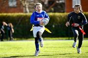7 March 2023; Lily May Cleary of St John of God school in action during the Leinster Rugby Girls Primary School Mega Blitz at Clontarf FC in Dublin. Photo by David Fitzgerald/Sportsfile