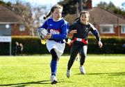 7 March 2023; Lily May Cleary of St John of God school in action during the Leinster Rugby Girls Primary School Mega Blitz at Clontarf FC in Dublin. Photo by David Fitzgerald/Sportsfile