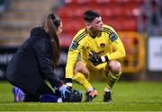6 March 2023; Cork City goalkeeper Jimmy Corcoran receives medical attention from sports therapist Orla McSweeney during the SSE Airtricity Men's Premier Division match between Shamrock Rovers and Cork City at Tallaght Stadium in Dublin. Photo by Piaras Ó Mídheach/Sportsfile