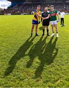 5 March 2023; Referee Brendan Cawley with team captains Brian Stack of Roscommon and Paddy Durcan of Mayo before the Allianz Football League Division 1 match between Roscommon and Mayo at Dr Hyde Park in Roscommon. Photo by Piaras Ó Mídheach/Sportsfile