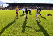 5 March 2023; Referee Brendan Cawley with team captains Brian Stack of Roscommon and Paddy Durcan of Mayo before the Allianz Football League Division 1 match between Roscommon and Mayo at Dr Hyde Park in Roscommon. Photo by Piaras Ó Mídheach/Sportsfile