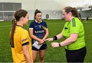 8 March 2023; Referee Katie Kilbane with team captains Eimile Loughran of Ulster University Magee and Fainche Grimes of DCU Dóchas Éireann for the coin toss before the 2023 Yoplait Ladies HEC Cup Final match between DCU Dóchas Éireann and Ulster University Magee at University of Galway Connacht GAA Air Dome in Bekan, Mayo. Photo by Piaras Ó Mídheach/Sportsfile