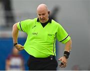 8 March 2023; Referee Shane Curley signals for a jersey pull during the 2023 Yoplait Ladies HEC Donaghy Cup Final match between University of Limerick and TUS Midwest at at University of Galway Connacht GAA Air Dome in Bekan, Mayo. Photo by Piaras Ó Mídheach/Sportsfile