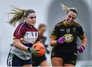 8 March 2023; Laura Scanlon of University of Limerick in action against Joanne Foley of TUS Midwest during the 2023 Yoplait Ladies HEC Donaghy Cup Final match between University of Limerick and TUS Midwest at at University of Galway Connacht GAA Air Dome in Bekan, Mayo. Photo by Piaras Ó Mídheach/Sportsfile