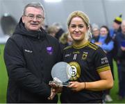 8 March 2023; Chloe Towey of TUS Midwest in presented with the Player of the Match award by Connacht LGFA President Con Moynihan after her side's victory in the 2023 Yoplait Ladies HEC Donaghy Cup Final match between University of Limerick and TUS Midwest at at University of Galway Connacht GAA Air Dome in Bekan, Mayo. Photo by Piaras Ó Mídheach/Sportsfile