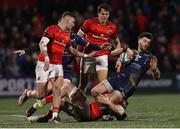 3 March 2023; Johnny Williams of Scarlets is tackled by Jack O'Donoghue of Munster during the United Rugby Championship match between Munster and Scarlets at Musgrave Park in Cork. Photo by Michael P Ryan/Sportsfile