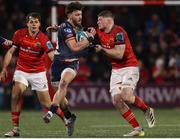 3 March 2023; Johnny Williams of Scarlets is tackled by Jack O'Donoghue of Munster during the United Rugby Championship match between Munster and Scarlets at Musgrave Park in Cork. Photo by Michael P Ryan/Sportsfile