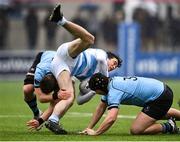 9 March 2023; Eoghan Walsh of Blackrock College is tackled by James White, left, and Riain Coogan of St Michael’s College during the Bank of Ireland Leinster Schools Senior Cup Semi Final match between St Michael’s College and Blackrock College at Energia Park in Dublin. Photo by David Fitzgerald/Sportsfile