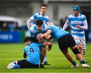 9 March 2023; Alex Mullan of Blackrock College is tackled by David Walsh, left, and Tom Stewart of St Michael’s College during the Bank of Ireland Leinster Schools Senior Cup Semi Final match between St Michael’s College and Blackrock College at Energia Park in Dublin. Photo by David Fitzgerald/Sportsfile