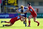 10 March 2023; Rocco Hill of St Andrew's College is tackled by Sean Byrne, left, and Dylan McNiece of CUS during the Bank of Ireland Vinnie Murray Cup Final match between CUS and St Andrew's College at Energia Park in Dublin. Photo by Seb Daly/Sportsfile