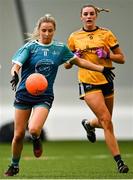 10 March 2023; Caoimhe O'Connor of TU Dublin in action against Chloe Darby of DCU Dóchas Éireann during the 2023 Yoplait Ladies HEC O’Connor Cup semi-final match between DCU Dóchas Éireann and TU Dublin at University of Galway Connacht GAA Air Dome in Bekan, Mayo. Photo by Piaras Ó Mídheach/Sportsfile