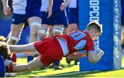 10 March 2023; Niall Cox of CUS scores his side's third try during the Bank of Ireland Vinnie Murray Cup Final match between CUS and St Andrew's College at Energia Park in Dublin. Photo by Seb Daly/Sportsfile