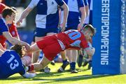 10 March 2023; Niall Cox of CUS scores his side's third try during the Bank of Ireland Vinnie Murray Cup Final match between CUS and St Andrew's College at Energia Park in Dublin. Photo by Seb Daly/Sportsfile