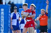 10 March 2023; Niall Cox of CUS, left, celebrates with teammates Lucas Maguire after scoring their side's third try during the Bank of Ireland Vinnie Murray Cup Final match between CUS and St Andrew's College at Energia Park in Dublin. Photo by Seb Daly/Sportsfile