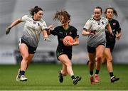 10 March 2023; Orla Duffy of Queen’s University Belfast is tackled by Erone Fitzpatrick of University of Limerick, 12, during the 2023 Yoplait Ladies HEC O’Connor Cup semi-final match between Queen’s University Belfast and University of Limerick at University of Galway Connacht GAA Air Dome in Bekan, Mayo. Photo by Piaras Ó Mídheach/Sportsfile