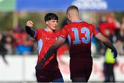 10 March 2023; Charlie O'Byrne, left, and Rian Tracey of CUS celebrate during the Bank of Ireland Vinnie Murray Cup Final match between CUS and St Andrew's College at Energia Park in Dublin. Photo by Seb Daly/Sportsfile
