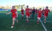 10 March 2023; Aidan Walsh of CUS, left, celebrates with teammates after their side's victory in the Bank of Ireland Vinnie Murray Cup Final match between CUS and St Andrew's College at Energia Park in Dublin. Photo by Seb Daly/Sportsfile