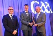 10 March 2023; Killian Corcoran of Shamrocks Ballyhale is presented with his AIB GAA Hurling Club Team of The Year award by GAA Vice President John Murphy, right, and AIB CMO Mark Doyle, at the AIB Club Players Awards at Croke Park in Dublin. Photo by Ramsey Cardy/Sportsfile