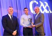10 March 2023; Kevin Molloy of Dunloy Cúchullain's is presented with his AIB GAA Hurling Club Team of The Year award by GAA Vice President John Murphy and AIB CMO Mark Doyle, at the AIB Club Players Awards at Croke Park in Dublin. Photo by Ramsey Cardy/Sportsfile