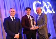 10 March 2023; Conal Cunning of Dunloy Cúchullain's is presented with his AIB GAA Hurling Club Team of The Year award by GAA Vice President John Murphy, right, and AIB CMO Mark Doyle, at the AIB Club Players Awards at Croke Park in Dublin. Photo by Ramsey Cardy/Sportsfile