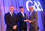 10 March 2023; Patrick Fitzgerald of Ballygunner is presented with his AIB GAA Hurling Club Team of The Year award by GAA Vice President John Murphy, right, and AIB CMO Mark Doyle, at the AIB Club Players Awards at Croke Park in Dublin. Photo by Ramsey Cardy/Sportsfile