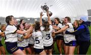 10 March 2023; DKIT celebrate after their victory in the 2023 Yoplait Ladies HEC Moynihan Cup Final match between ATU Sligo and DKIT at University of Galway Connacht GAA Air Dome in Bekan, Mayo. Photo by Piaras Ó Mídheach/Sportsfile