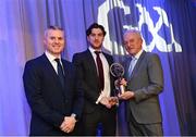 10 March 2023; Andrew McGowan of Kilmacud Crokes is presented with his AIB GAA Football Club Team of The Year award by GAA Vice President John Murphy, right, and AIB CMO Mark Doyle, at the AIB Club Players Awards at Croke Park in Dublin. Photo by Ramsey Cardy/Sportsfile