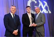 10 March 2023; Ethan Doherty of Watty Graham’s Glen is presented with his AIB GAA Football Club Team of The Year award by GAA Vice President John Murphy, right, and AIB CMO Mark Doyle, at the AIB Club Players Awards at Croke Park in Dublin. Photo by Ramsey Cardy/Sportsfile