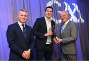 10 March 2023; David Moran of Kerins O’Rahilly’s is presented with his AIB GAA Football Club Team of The Year award by GAA Vice President John Murphy, right, and AIB CMO Mark Doyle, at the AIB Club Players Awards at Croke Park in Dublin. Photo by Ramsey Cardy/Sportsfile