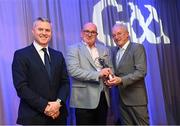 10 March 2023; John Bradley, father of Emmett Bradley of Watty Graham’s Glen, collects AIB GAA Football Club Team of The Year award on his behalf from GAA Vice President John Murphy, right, and AIB CMO Mark Doyle, at the AIB Club Players Awards at Croke Park in Dublin. Photo by Ramsey Cardy/Sportsfile