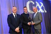 10 March 2023; Shane Cunningham of Kilmacud Crokes is presented with his AIB GAA Football Club Team of The Year award by GAA Vice President John Murphy, right, and AIB CMO Mark Doyle, at the AIB Club Players Awards at Croke Park in Dublin. Photo by Ramsey Cardy/Sportsfile