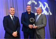 10 March 2023; Eddie Doherty, father of Jack Doherty of Watty Graham’s Glen, collects AIB GAA Football Club Team of The Year award on his behalf from GAA Vice President John Murphy, right, and AIB CMO Mark Doyle, at the AIB Club Players Awards at Croke Park in Dublin. Photo by Ramsey Cardy/Sportsfile