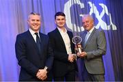 10 March 2023; Dara Mullin of Kilmacud Crokes is presented with his AIB GAA Football Club Team of The Year award by GAA Vice President John Murphy, right, and AIB CMO Mark Doyle, at the AIB Club Players Awards at Croke Park in Dublin. Photo by Ramsey Cardy/Sportsfile