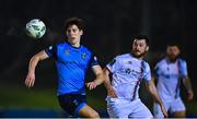 10 March 2023; Dara Keane of UCD in action against Ryan Brennan of Drogheda United during the SSE Airtricity Men's Premier Division match between UCD and Drogheda United at UCD Bowl in Dublin. Photo by Stephen Marken/Sportsfile